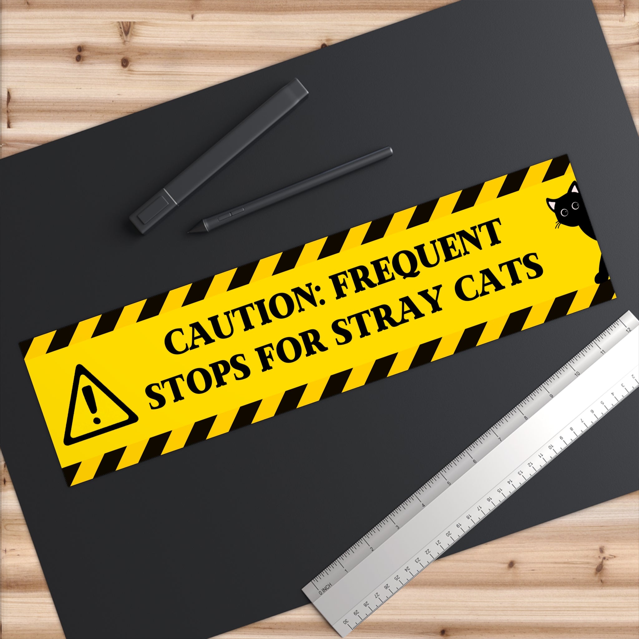 “Caution: Frequent Stops for Stray Cats” Bumper Sticker